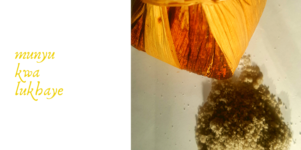 grains of munyu kwa lukhaye besides some of the same packed in banana leaves