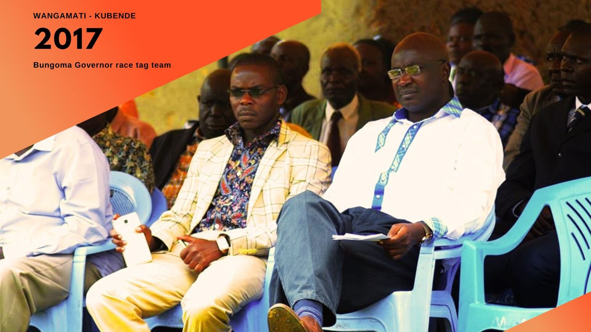 Kubende Wa'wekhomba sitting next to Wycliffe Wangamati at an event during the 2017 Bungoma county governor campaigns