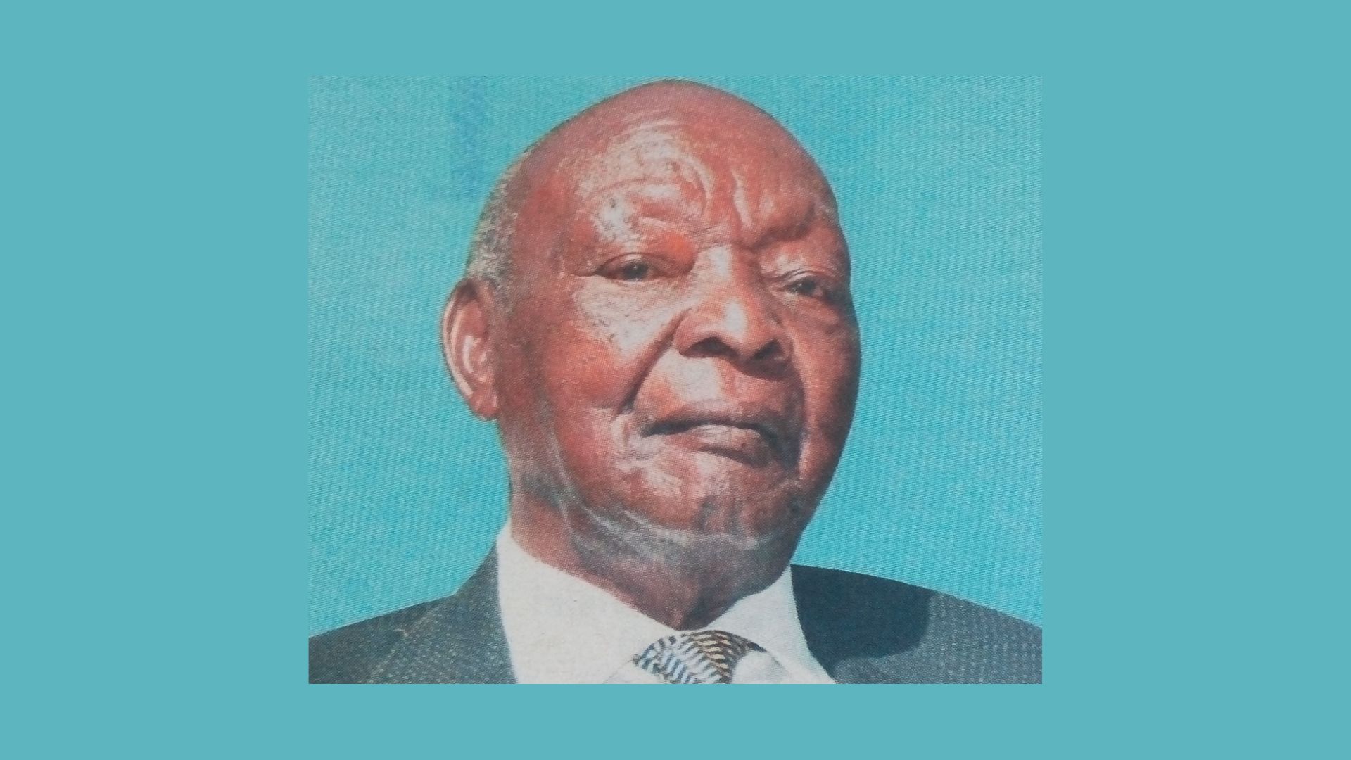 portrait of Joseph Daniel Otiende with a blue background