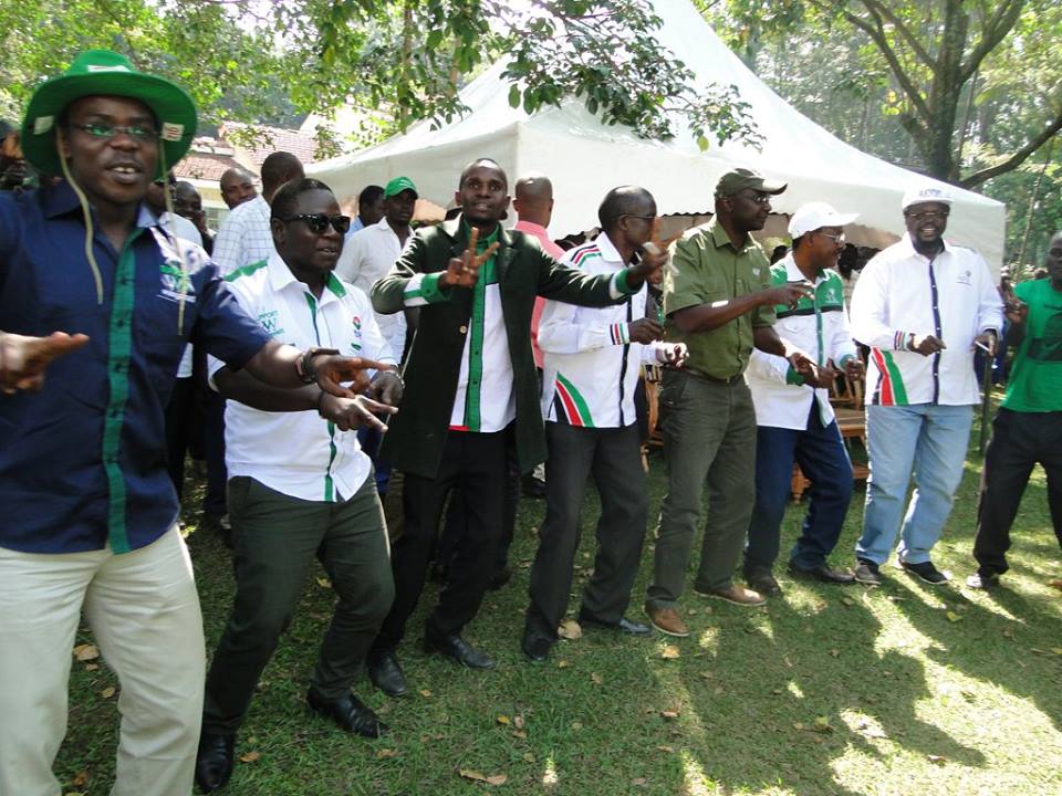 Ford Kenya party leader, officials and aspirants including Governor Wycliffe Wafula Wangamati dance at a function