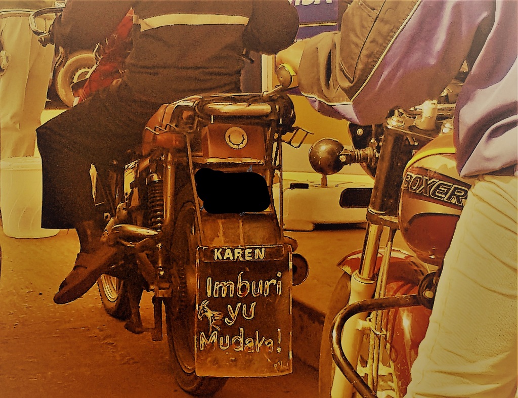 Image of motorcycle rear mud guard with maragoli proverb imburi yu mudaka yivura amalongo dave