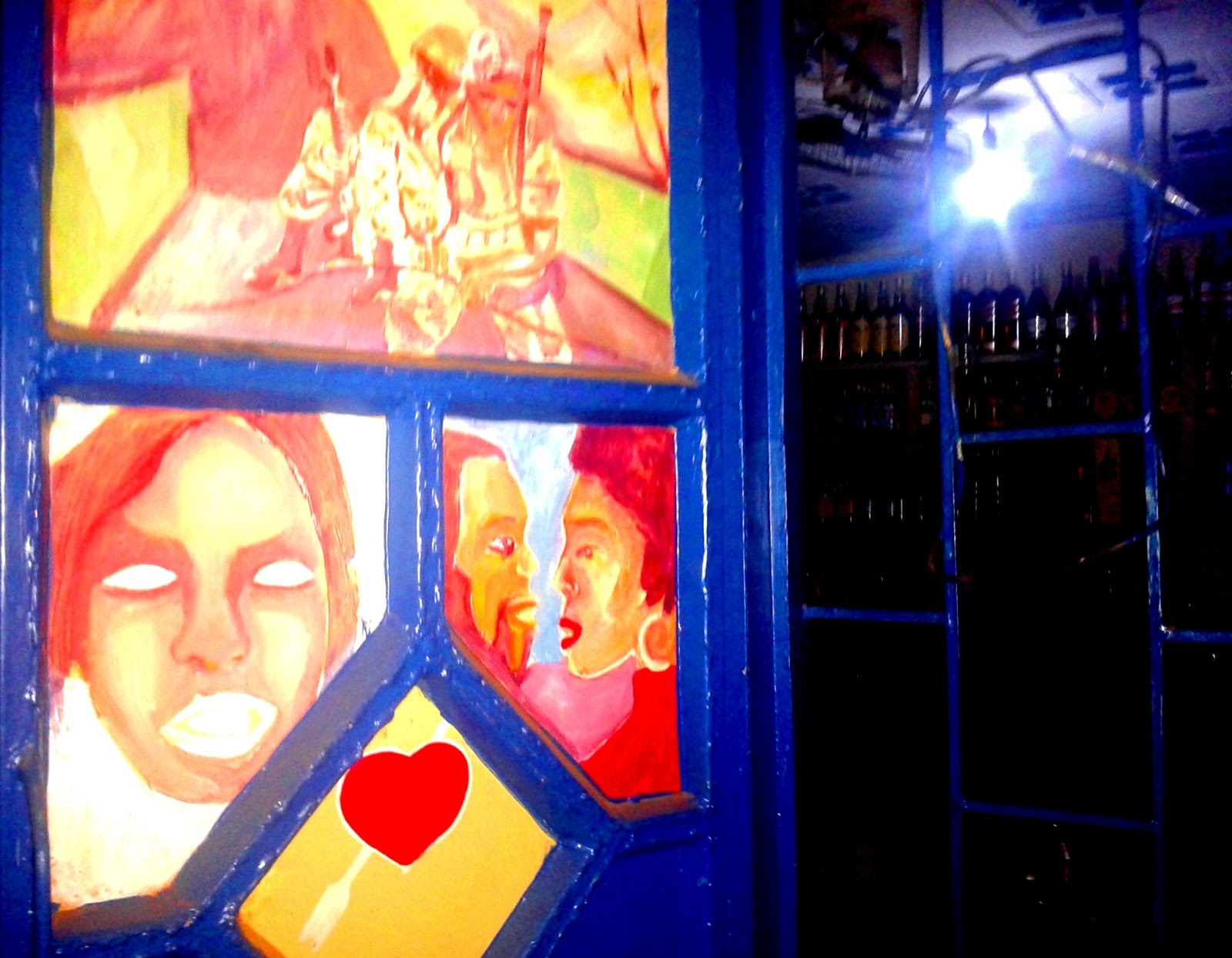 Graffiti on the door of an entertainment spot in Nalongo, Busia on the Kenya-Uganda border