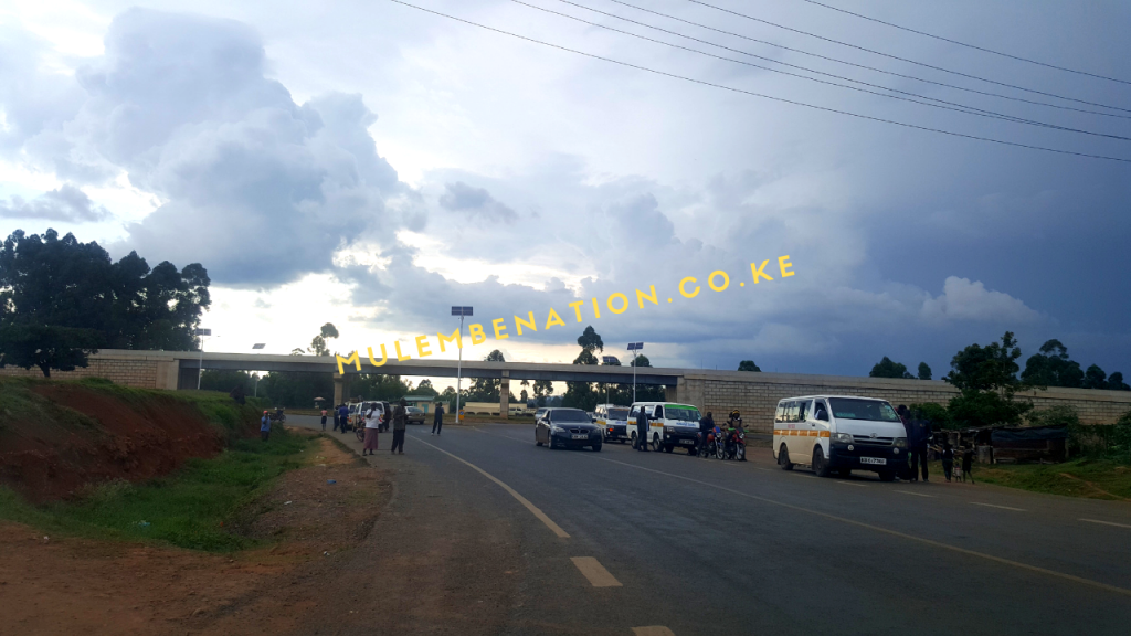Image of overpass and roundabout at Chavakali junction with matatus in the foreground at Chavakali in Vihiga County 