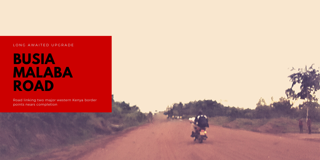 A man rides on a boda boda along an incomplete section of the Busia Malaba road