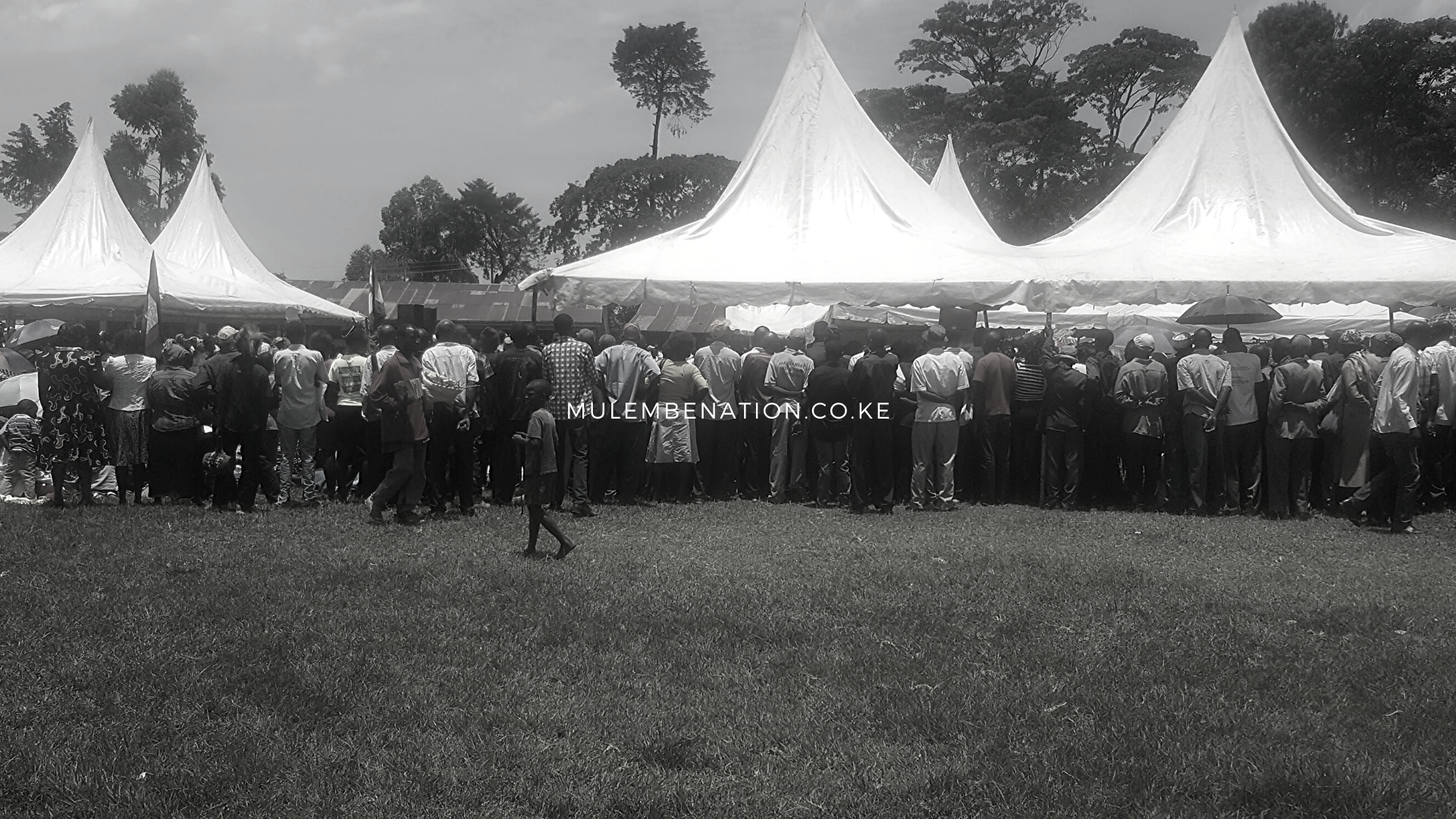 crowd  gathered at mkebi, traditional circumciser , Ngori's funeral 