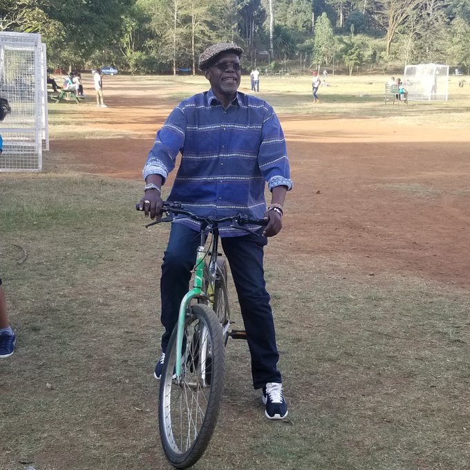 Musikari Kombo, a way from the days of Ford Kenya coup after coup, rides a bike outdoors